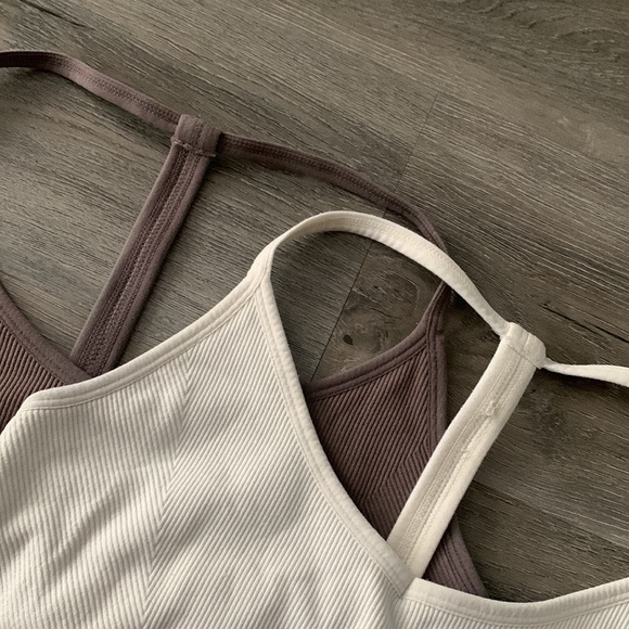 Two white and purple athletic cropped tank tops. - Picture 2 of 5